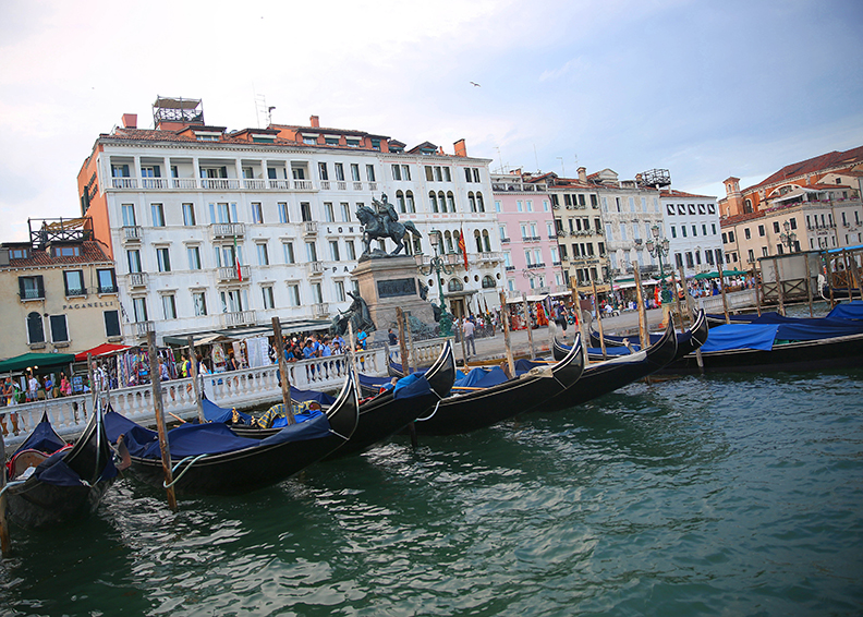 A scene from Venice, Italy.  Venice, the capital of northern Italy’s Veneto region, is built on more than 100 small islands in a lagoon in the Adriatic Sea. It has no roads, just canals – including the Grand Canal thoroughfare – lined with Renaissance and Gothic palaces.