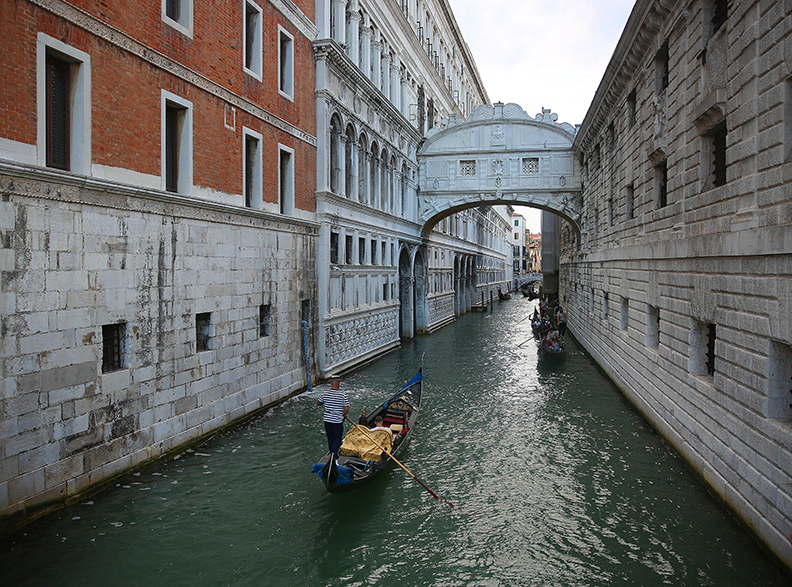 The Bridge of Sighs in Venice, Italy.  Venice, the capital of northern Italy’s Veneto region, is built on more than 100 small islands in a lagoon in the Adriatic Sea. It has no roads, just canals – including the Grand Canal thoroughfare – lined with Renaissance and Gothic palaces.